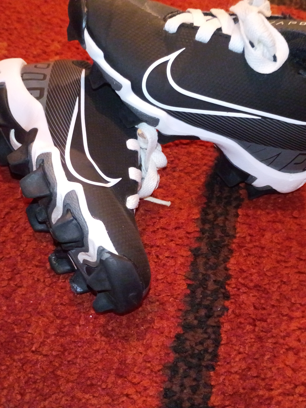 Nike Black and White Cleats